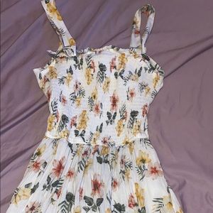 dark white flower romper. cut out back